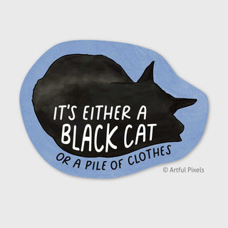 Sticker with black cat silhouette and text that reads "It's either a black cat or a pile of clothes" on a light blue background