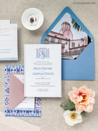 Custom wedding invitations with watercolor illustrations of the venue